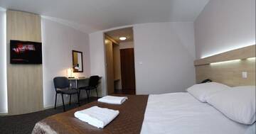 Фото номера Двухместный номер с 1 кроватью Отель Hotel Junior г. Замосць 3