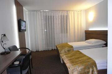 Фото номера Двухместный номер с 1 кроватью или 2 отдельными кроватями Отель Hotel Junior г. Замосць 4