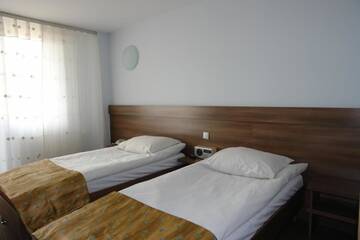 Фото номера Двухместный номер с 1 кроватью или 2 отдельными кроватями Отель Hotel Junior г. Замосць 2