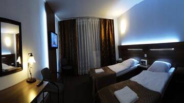 Фото номера Двухместный номер с 1 кроватью или 2 отдельными кроватями Отель Hotel Junior г. Замосць 6