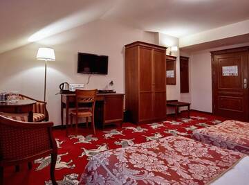 Фото номера Стандартный двухместный номер с 2 отдельными кроватями Отель Hotel Koronny г. Замосць 5