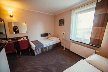 Фото номера Двухместный номер с 2 отдельными кроватями Отель Hotel Wojto г. Замосць 12