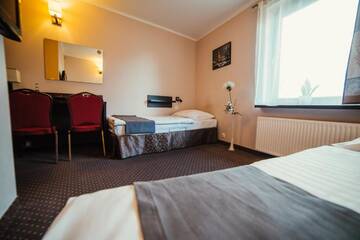 Фото номера Двухместный номер с 2 отдельными кроватями Отель Hotel Wojto г. Замосць 14