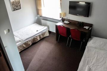 Фото номера Двухместный номер с 2 отдельными кроватями Отель Hotel Wojto г. Замосць 19