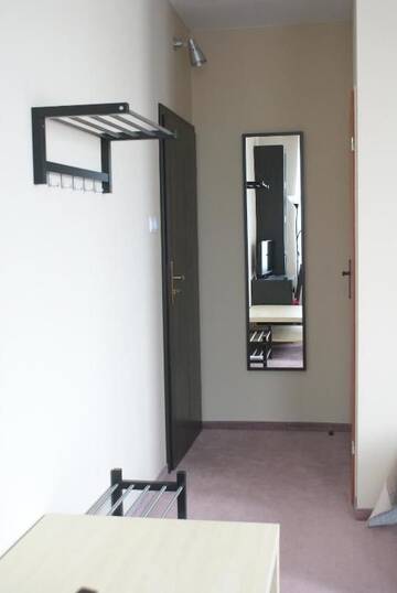 Фото номера Стандартный номер с 2 односпальными кроватями и диваном Хостелы Hostel Zamość г. Замосць 4