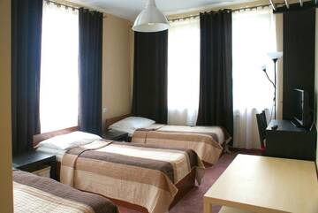 Фото номера Стандартный номер с 2 односпальными кроватями и диваном Хостелы Hostel Zamość г. Замосць 8